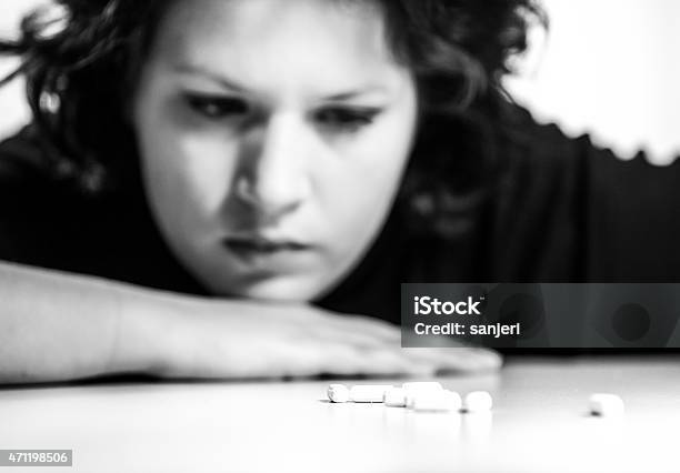 Woman With Headache And Pill Stock Photo - Download Image Now - 2015, Addiction, Adult