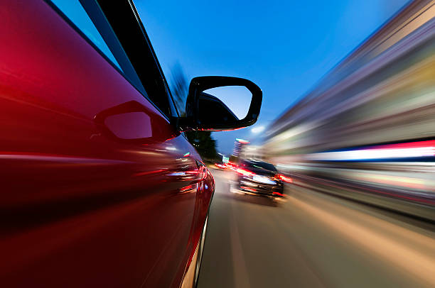 istock car on the road with motion blur background 471198949