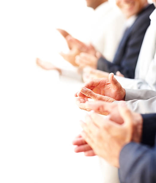 istock Side view of a group of business colleagues clapping hands 471199849