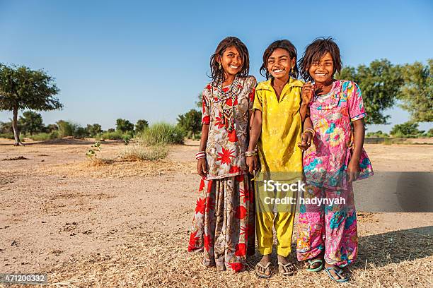 Group Of Happy Indian Girls Desert Village India Stock Photo - Download Image Now - Child, India, Togetherness