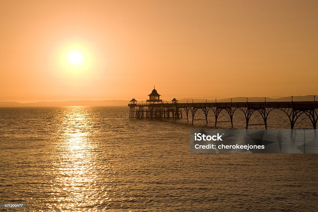 pier silhouette sunset an english summer sunset with a silhouette  view of a pier Back Lit Stock Photo