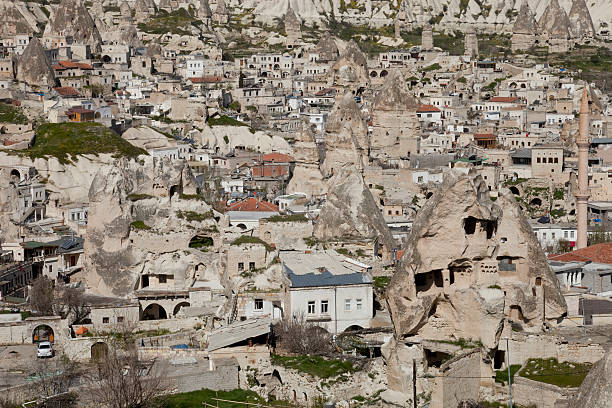 Closeup Göreme, Cappadocia, Turkey Göreme, located among the "fairy chimney" rock formations, is a town in Cappadocia, a historical region of Turkey. It is in the Nevşehir Province in Central Anatolia. The Göreme National Park was added to the UNESCO World Heritage List in 1985. Goreme stock pictures, royalty-free photos & images