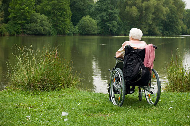 istock Senior woman in wheelchair 471202949