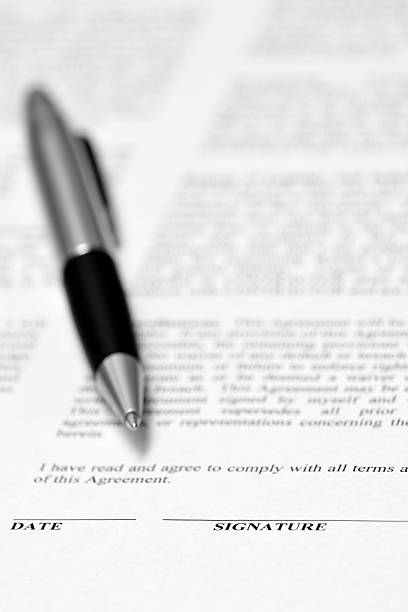 Contract Agreement on Desk with Pen stock photo