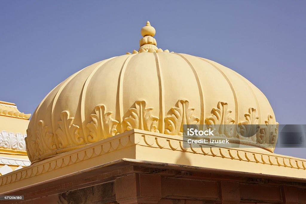 Yellow dome, indian architecture Yellow dome against blue sky. Indian architecture. 2015 Stock Photo