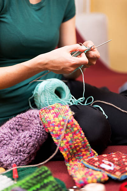 istock closeup of a knitting female 471206266