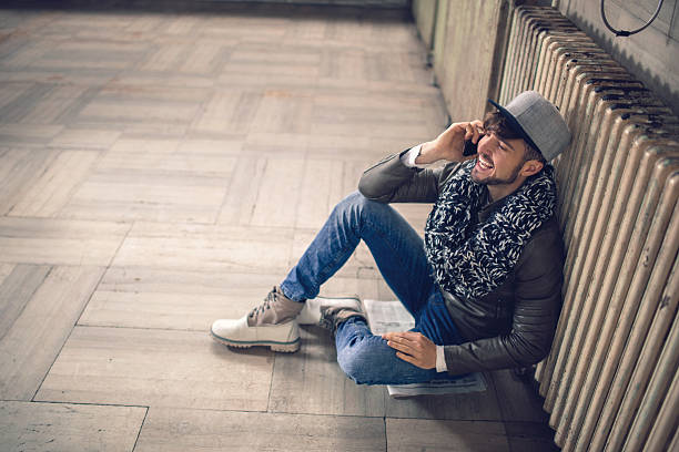 istock Above view of cheerful hipster talking on mobile phone. 471206448