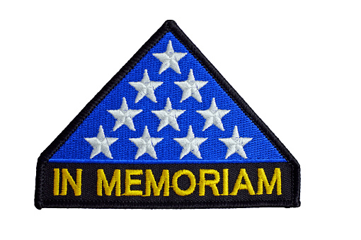 Triangle shaped US flag patch (given to family of fallen heroes) with \