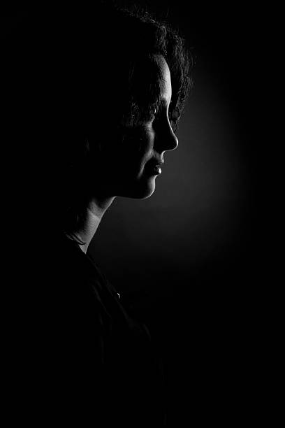 istock Low Key Portrait of an Girl Black & White 471209607