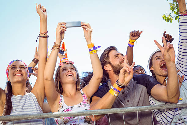 istock Excited music fans up the front 471210190