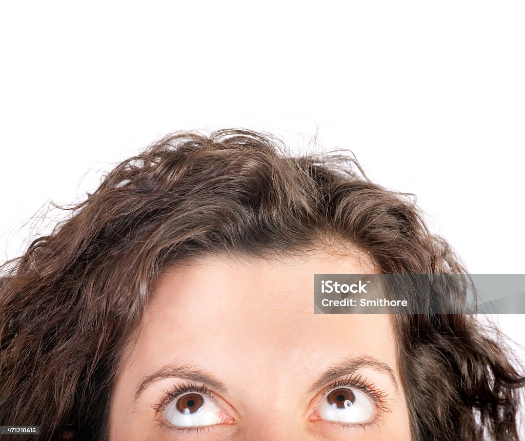 cropped woman looking up half face of woman looking up isolated on white Adult Stock Photo