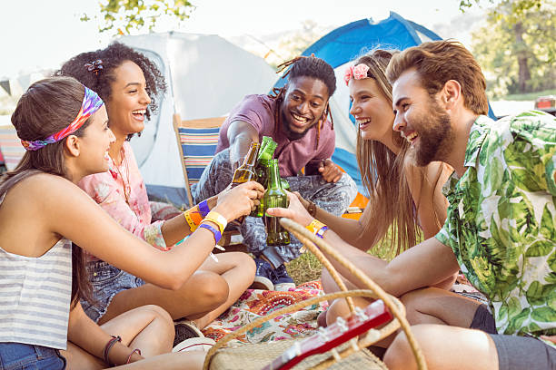 istock Hipsters having fun in their campsite 471211002