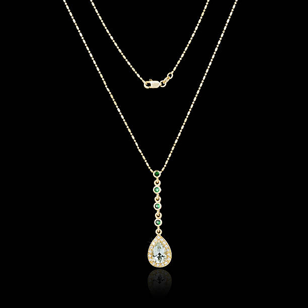 istock Golden necklace isolated on black background 471211008