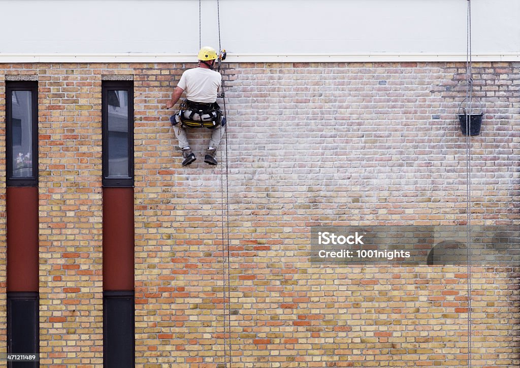 Männer stellt das Haus - Lizenzfrei Anstreicher Stock-Foto