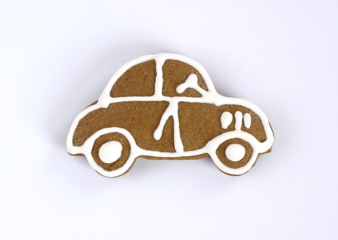 Christmas gingerbread car on white background.