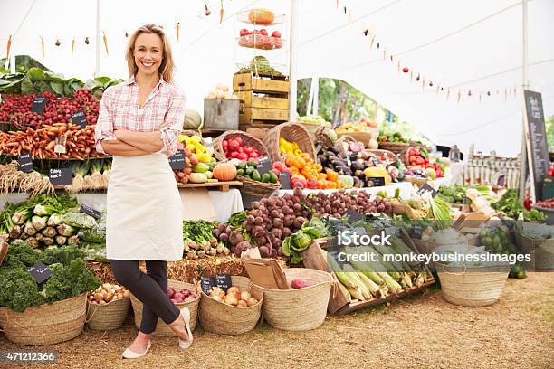 Large Fresh Food Market With Employee Stock Photo - Download Image Now - Farmer's Market, Market - Retail Space, Market Stall