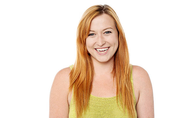 istock Smiling woman posing over white 471212464