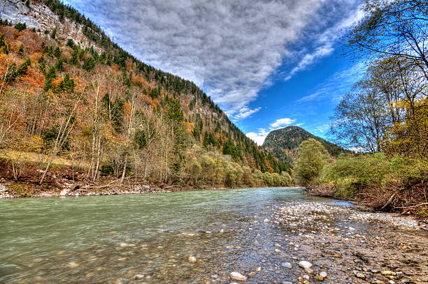 istock Rocks in the flowing river at the mountains 471213108