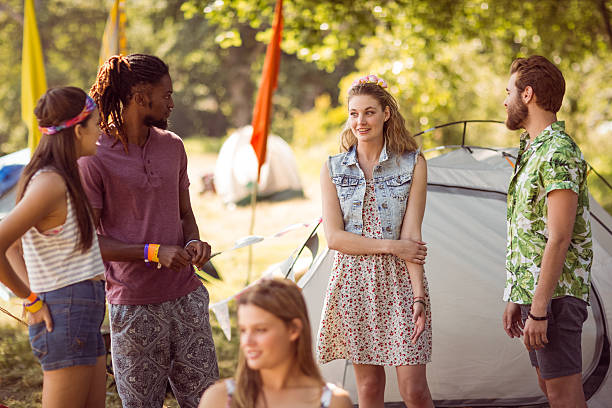 istock Hipsters having fun in their campsite 471217040