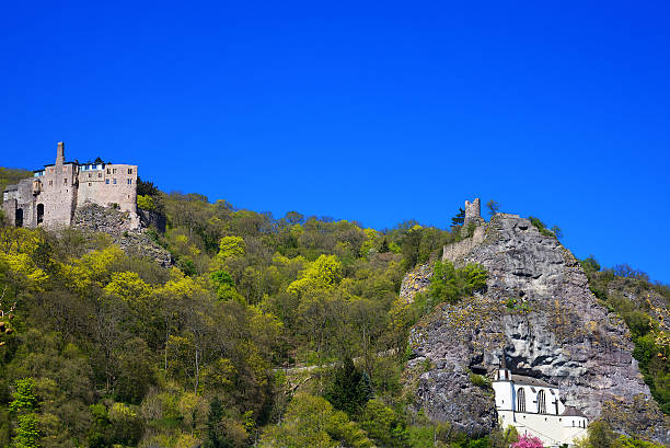 istock Church built into rock face with castle ruin on hilltop 471217158