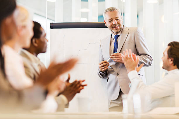 istock Business people congratulating their colleague on good presentation. 471217190