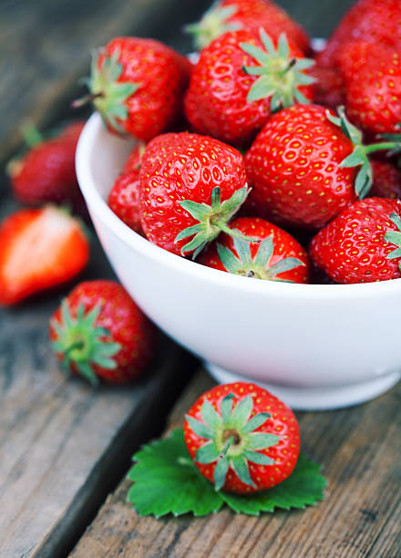 istock Strawberries on a wooden. 471217448