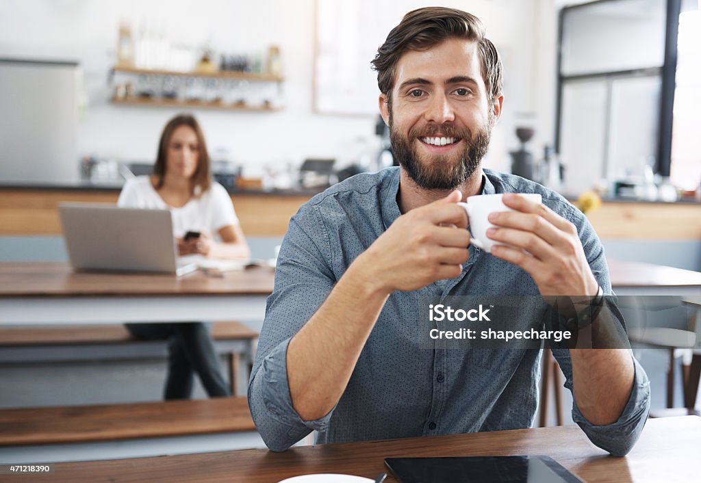 Having a great start to the day Cropped portrait of a handsome young man having coffee at a cafehttp://195.154.178.81/DATA/i_collage/pu/shoots/799434.jpg 20-29 Years Stock Photo