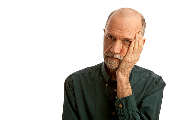 istock Senior Adult Male With Flat Affect Looking into Camera 471220057