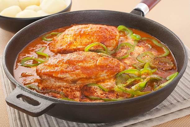 istock Chicken Paprika Stew in a Cast Iron Skillet 471220543