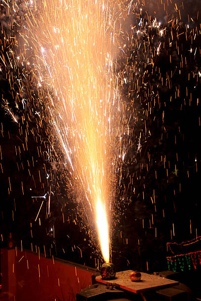Golden sparkles of beautiful firecrackers. Christmas and New Year festival celebration and enjoyment.