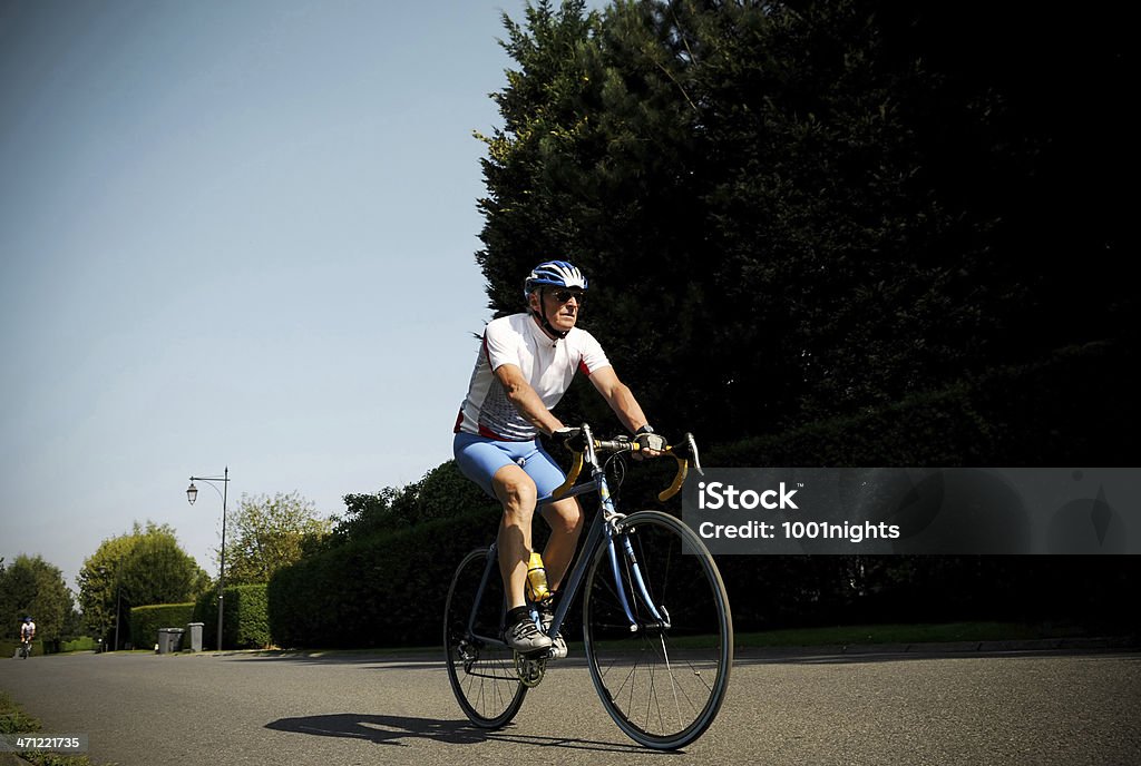 Bike Touring Old man on the bicycle Bicycle Stock Photo