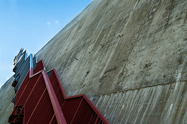 istock Metal stairs on the gray concrete wall 471225196