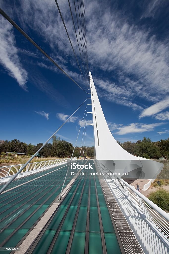 Sundial Bridge Sundial Bridge is a cantilever spar cable-stayed bridge for bicycles and pedestrians that spans the Sacramento River in Redding, California Footbridge Stock Photo