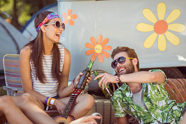 istock Happy hipsters relaxing on the campsite 471225602