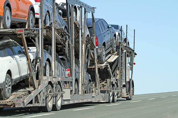 istock Semi Truck Vehicle Transporter Travelling A Highway With Full Load 471226290