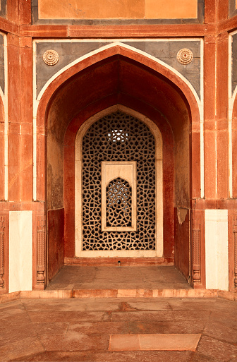 Arch with carved marble window. Mughal style.  Humayun's tomb, Delhi