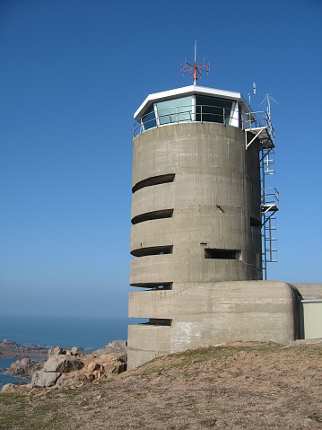 A coastguard station converted from a German WW11 artillery bunker and gun emplacement on the Island of Jersey in the Channel Isles built during the occupation of the Isles in World War Two and then later adapted for use by the coastguard.