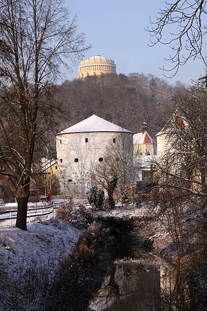 view from town Kelheim (Bavaria) to its landmarks "Schleiferturm" (part of the former city wall) and "Befreiungshalle" (Hall of liberation) which King Ludwig I of Bavaria  built from 1842 – 1863 as a memorial in honour of the military struggles against Napoleon in 1813-1815 and German independence