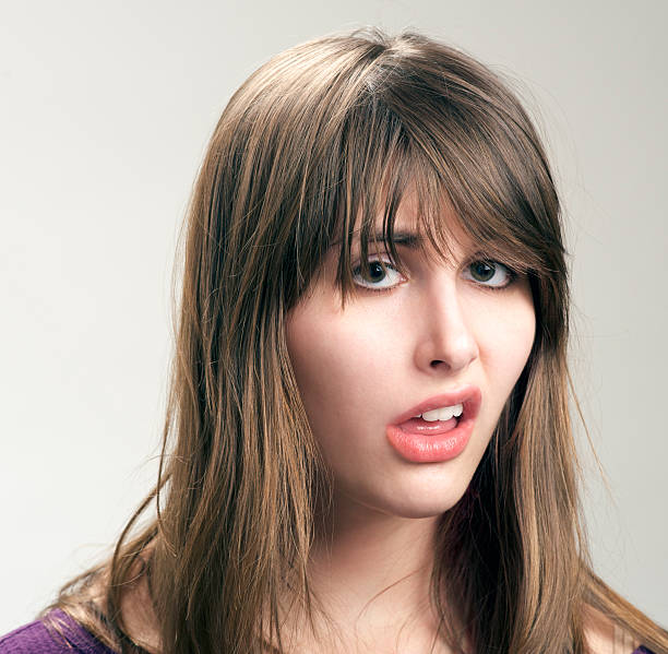 Nervous football fan in yellow on white background