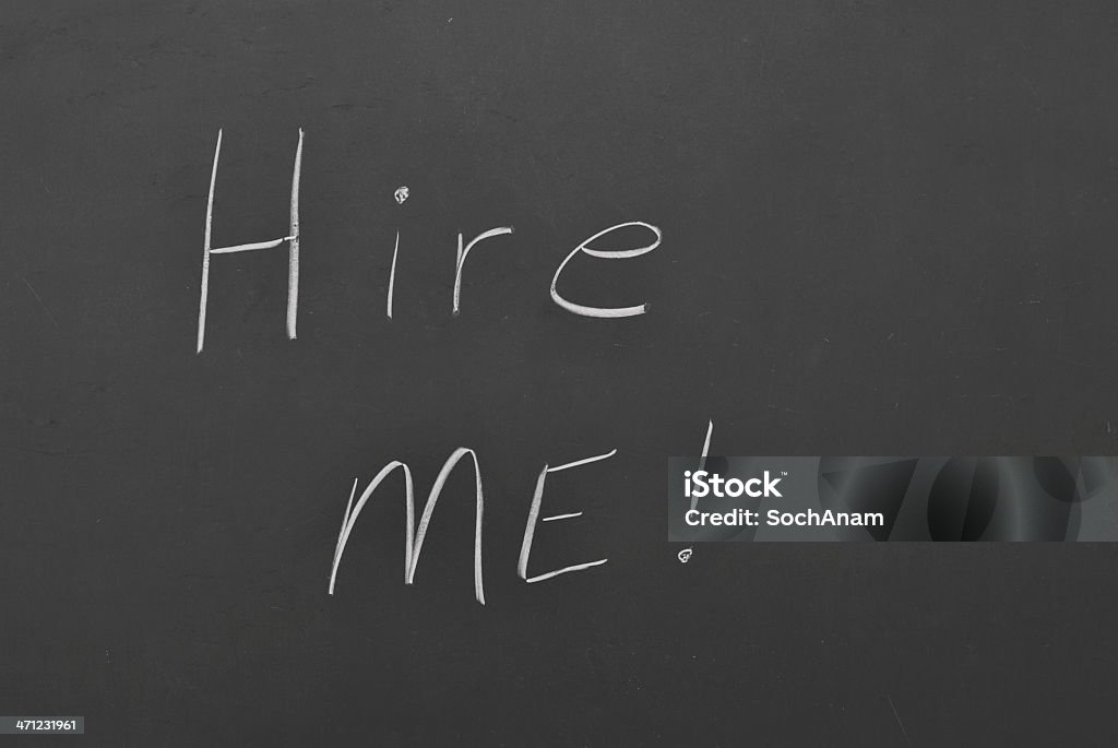 Hire Me Written On A Blackboard "Hire Me" written on a blackboard representing the concept of the hiring new graduates Black Color Stock Photo