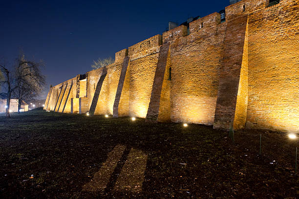 istock Old houses behind city wall 471233147