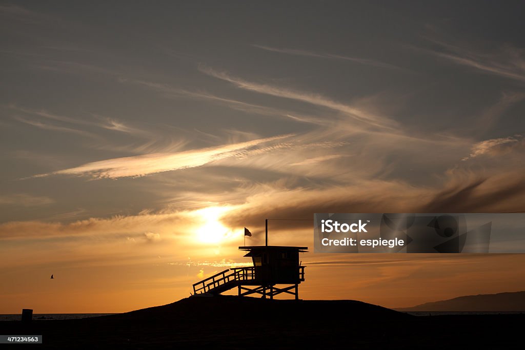 Stazione di Santa Monica bagnino al tramonto - Foto stock royalty-free di Acqua