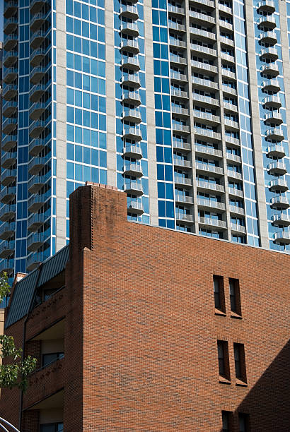istock Office glass building abd brick block 471234853