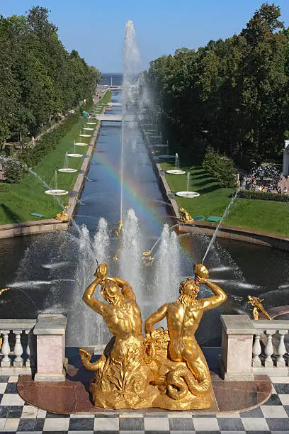 The fountains of Peterhof (suburb of St. Petersburg) are one of Russia's most famous tourist attractions, drawing millions of visitors every year. The most famous ensemble of fountains, the Grand Cascade, which runs from the northern facade of the Grand Palace to the Marine Canal, comprises 64 different fountains, and over 200 bronze statues, bas-reliefs, and other decorations. At the center stands Rastrelli's spectacular statue of Samson wrestling the jaws of a lion.