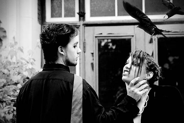 Young Man Choking a Woman At Night Young Man Choking a Woman At Night in front of an abandoned building. woman strangles man stock pictures, royalty-free photos & images