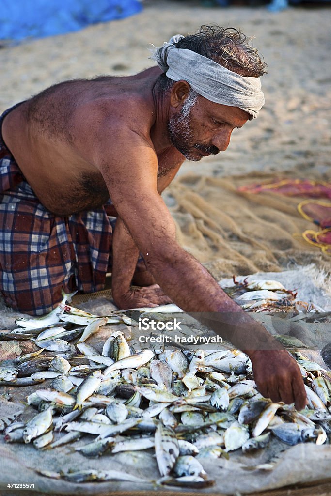 Indian pêcheur - Photo de Accroupi libre de droits