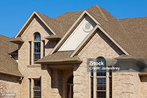 Gabled Roof Beige Brick Mansion House Exterior Architectural Design Stock Photo - Download Image Now