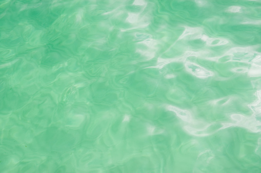Rippled water surface background texture in St Ives, Cornwall.