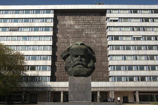 Chemnitz, Germany - May 8, 2012: People in front of the Karl Marx Monument by Soviet sculptor Lev Kerbel in Chemnitz, Saxony, Germany.