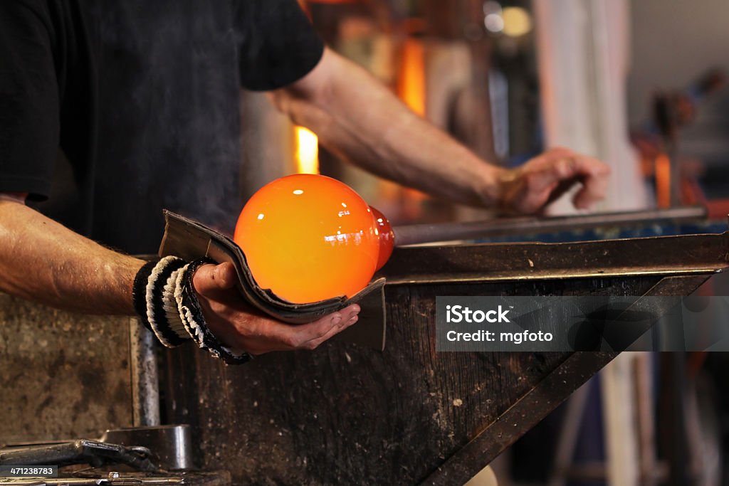 Art of glass blowing Glass Blower Stock Photo